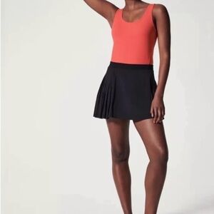 SPANX L Get Movin black athletic woman front pleated casual athleisure skort